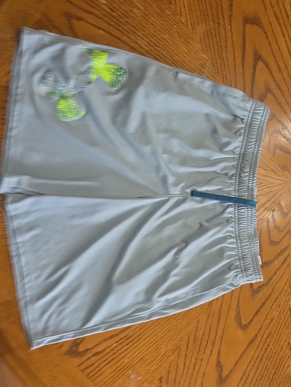 Under Armour Men's Light Gray Athletic Shorts with Neon Yellow Logo
